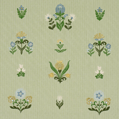 Woven fabric with embroidered leaf motif.