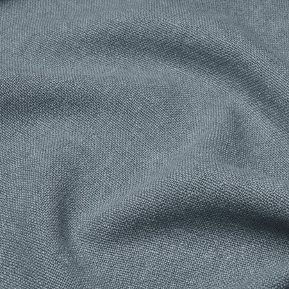 Sky blue linen solid fabric close-up with soft drape and subtle texture, suitable for clothing or home decor.