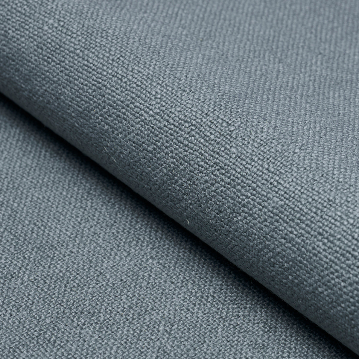 Sky linen fabric, folded, close-up.