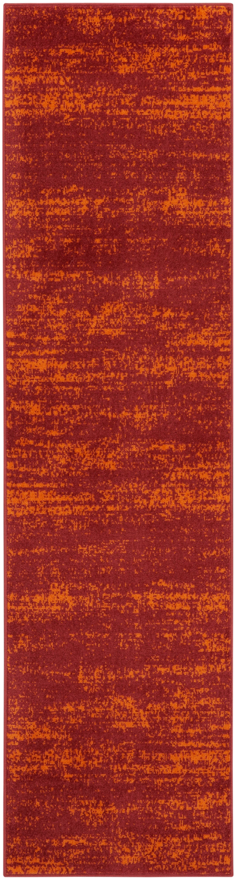 Long rectangular rug runner with maroon and orange abstract distressed pattern.