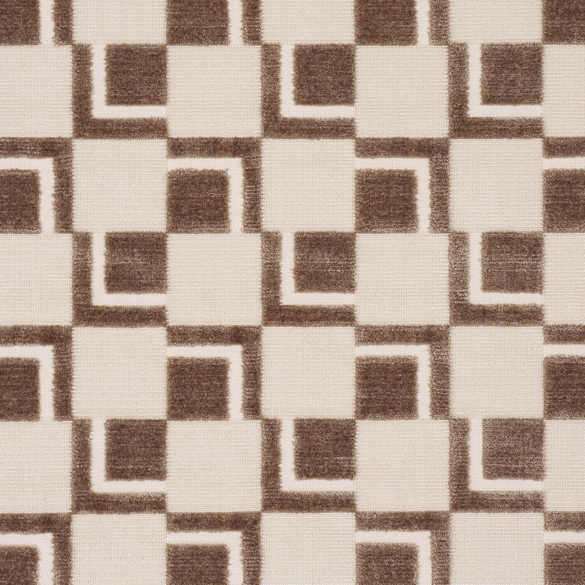 Beige and brown geometric rug pattern with interlocking squares and L-shaped corners; textured woven look.