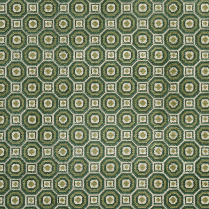 Olive-green and cream geometric textile with concentric circles and square motifs in a retro tile pattern.