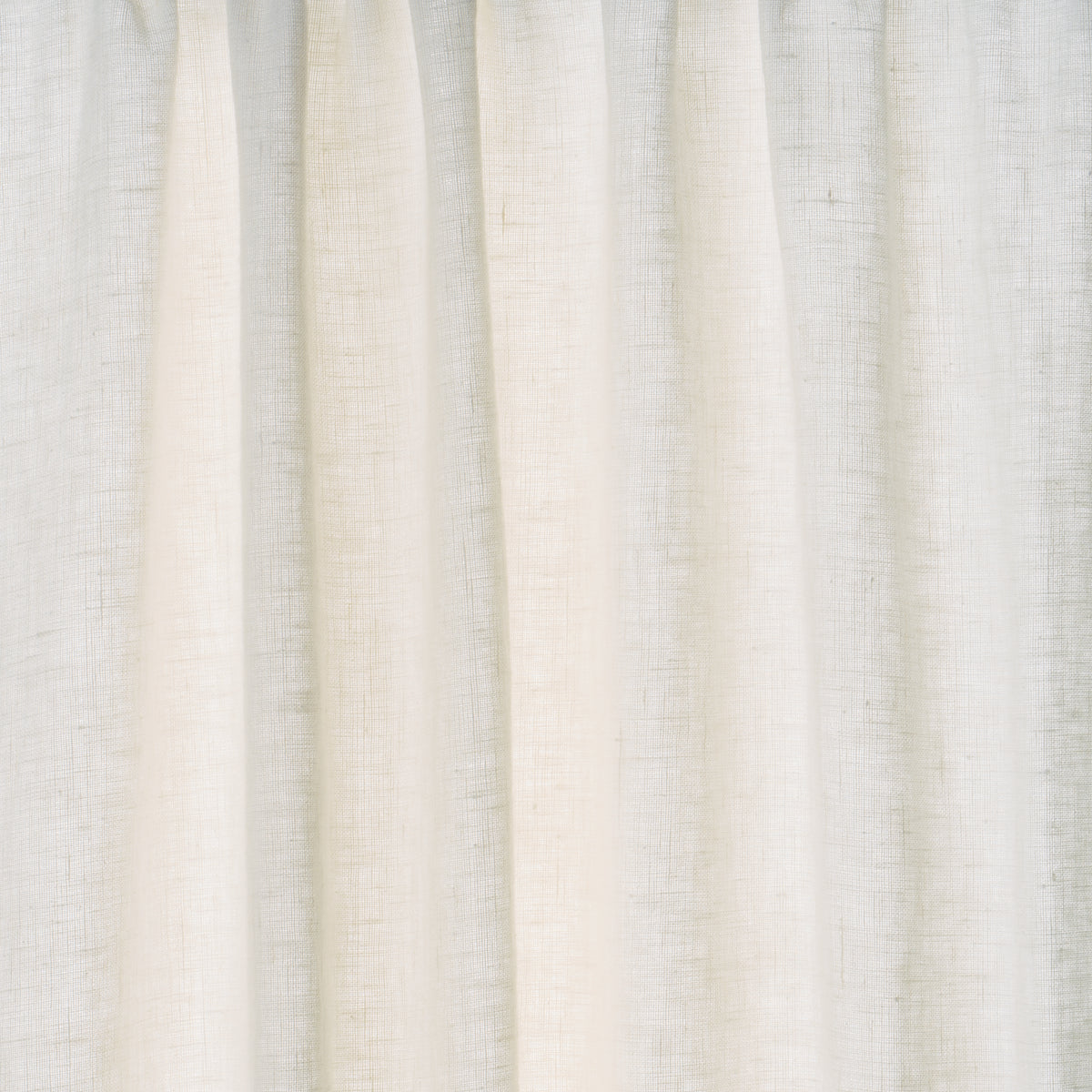 Cream linen-looking curtain panel with soft vertical folds for airy window decor.