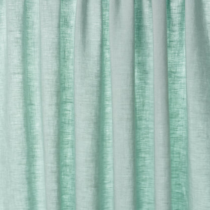Mint green, linen-textured curtains with vertical folds for airy, modern window decor.