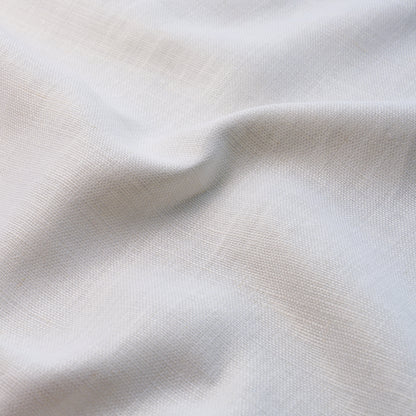 Cream-white woven fabric with fine texture and soft drape, ideal for garments or light upholstery.