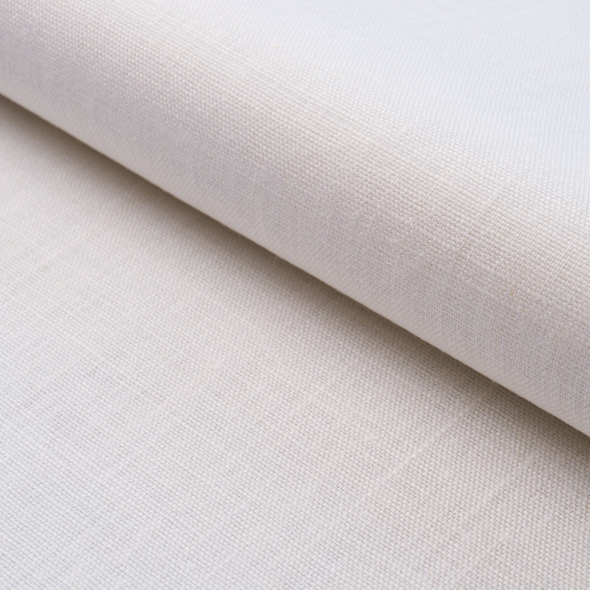 Beige linen fabric roll with visible weave and soft texture, neutral upholstery textile.