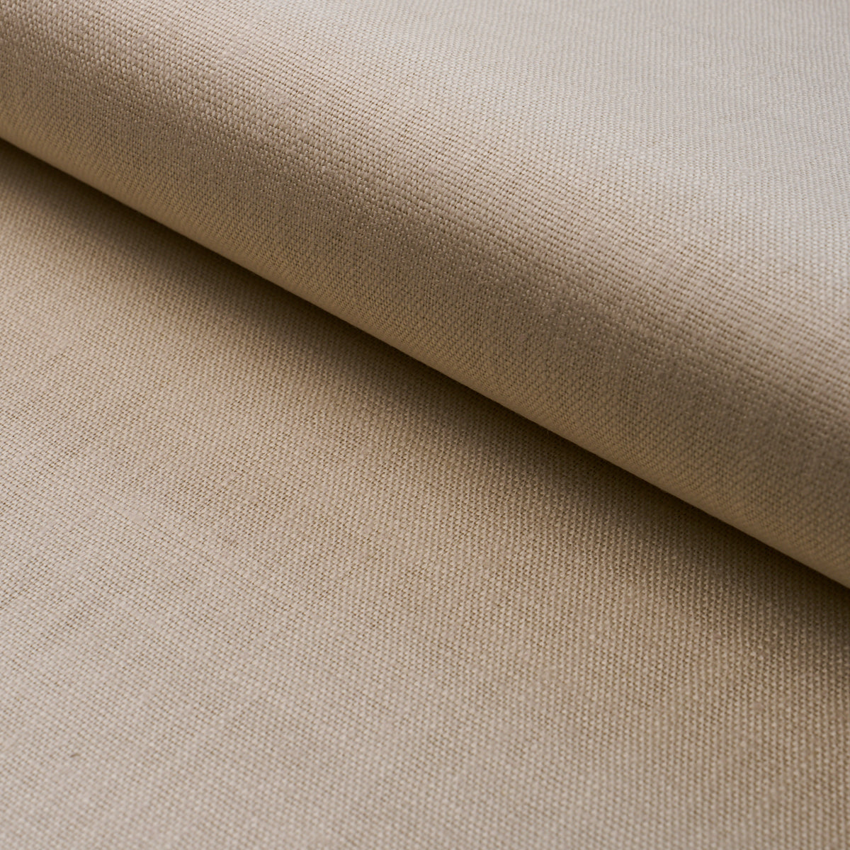 Beige woven fabric roll with linen-like texture, soft neutral color, ideal upholstery or craft material.