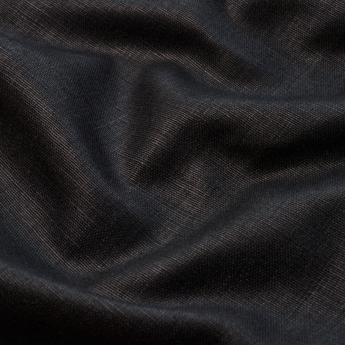 Dark charcoal twill fabric with soft drape and subtle sheen.
