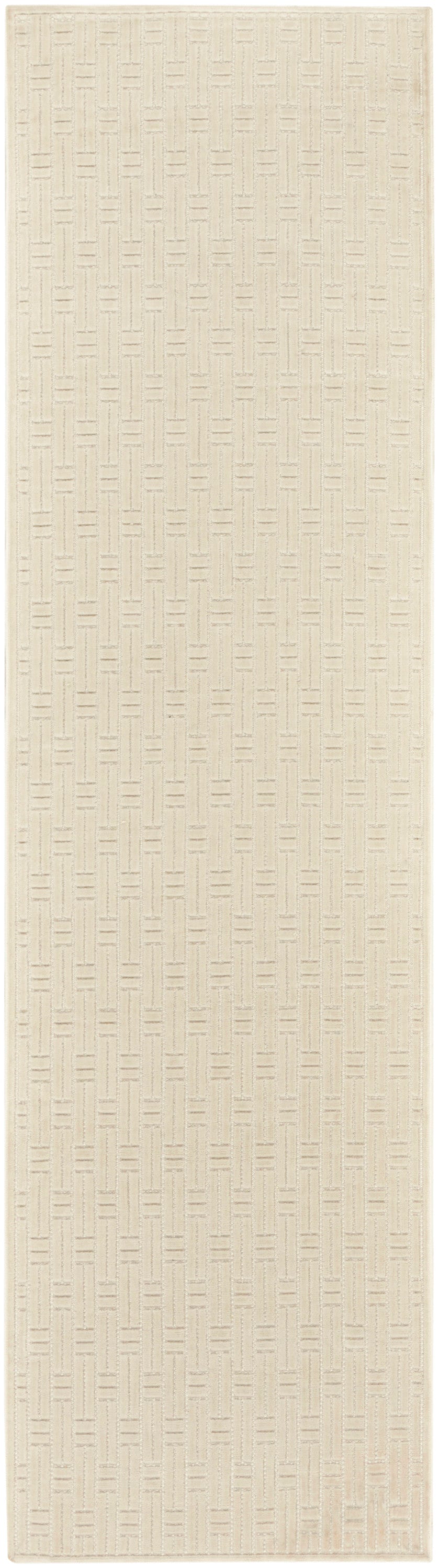 Beige rug runner with a subtle embossed geometric grid pattern; soft, textured decor.