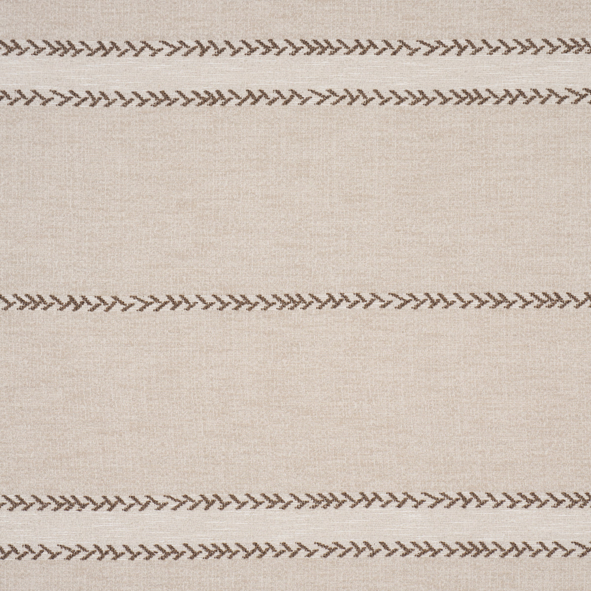 Beige woven fabric with repeating brown zigzag chevron stitch stripes across the surface.
