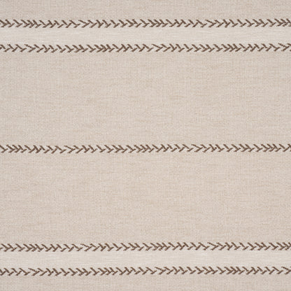 Beige woven fabric with repeating brown zigzag chevron stitch stripes across the surface.