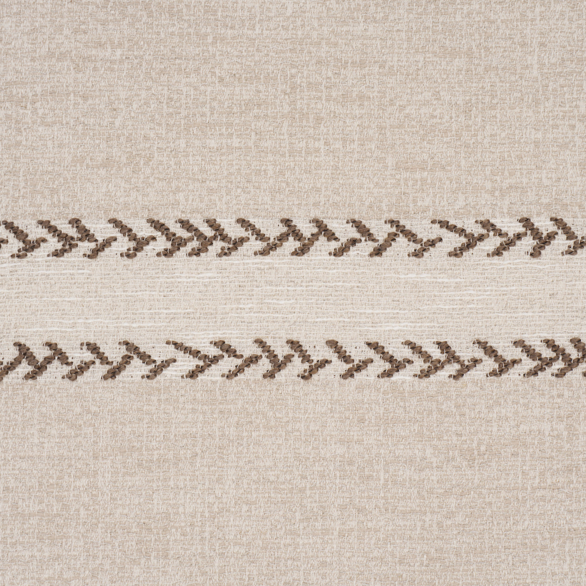 Beige textured fabric with two parallel brown decorative zigzag stitches running across.