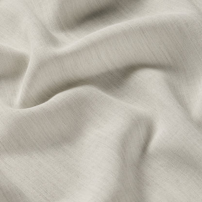 Cream textured fabric with soft drape & visible weave, ideal for home decor or upholstery swatches