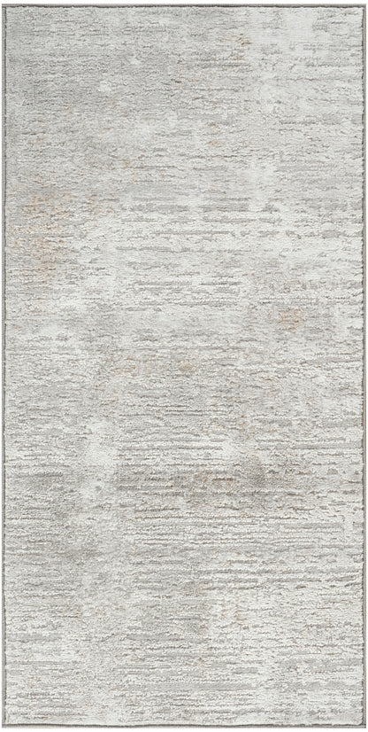 Rectangular silver-gray area rug with subtle distressed texture for modern living spaces.