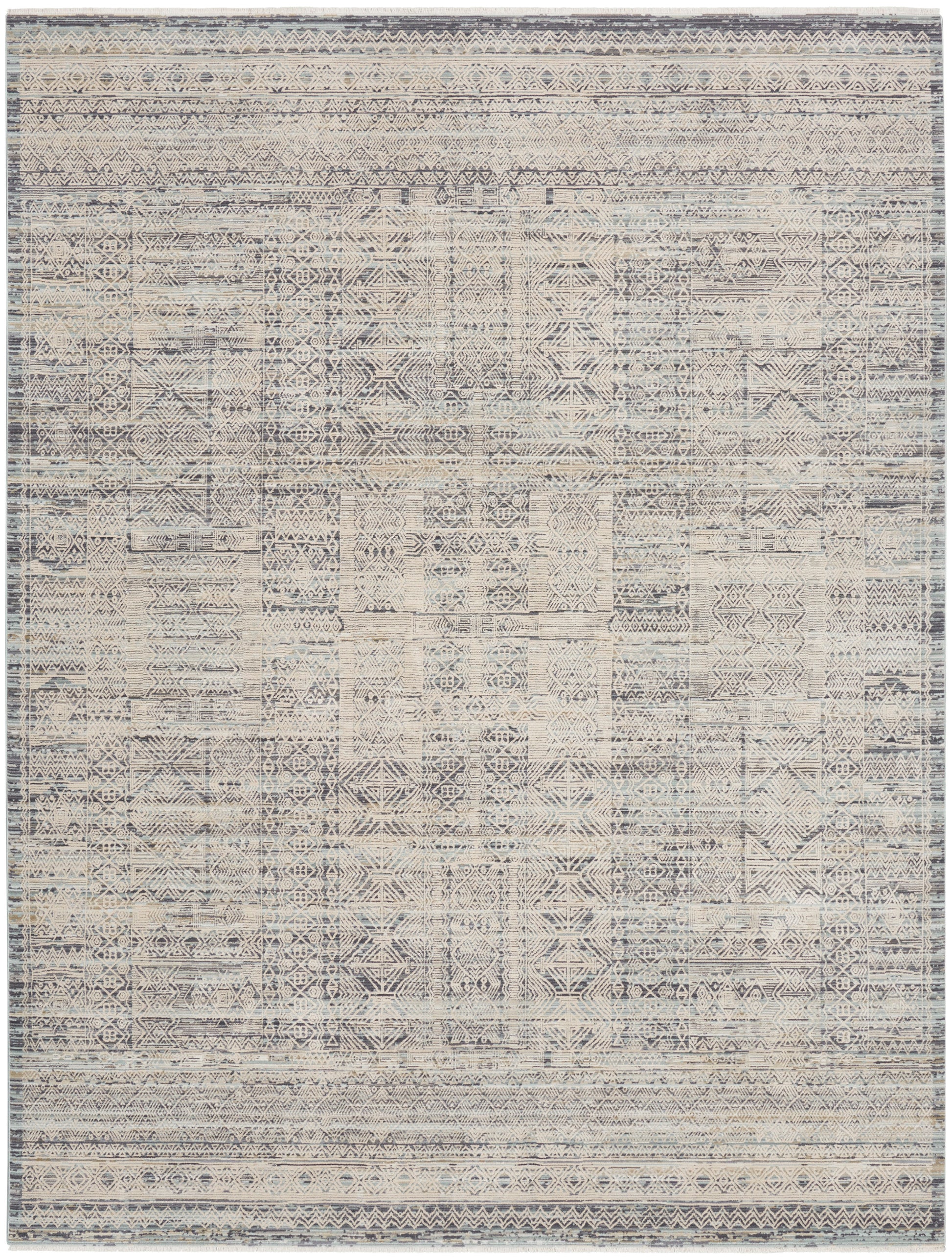 Distressed kilim rug in blue-gray and cream, geometric patchwork with bordered edges for a rustic, boho look.