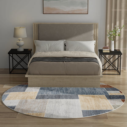 Beige upholstered platform bed with padded headboard, white bedding, black metal X-frame nightstands, and round patchwork rug.