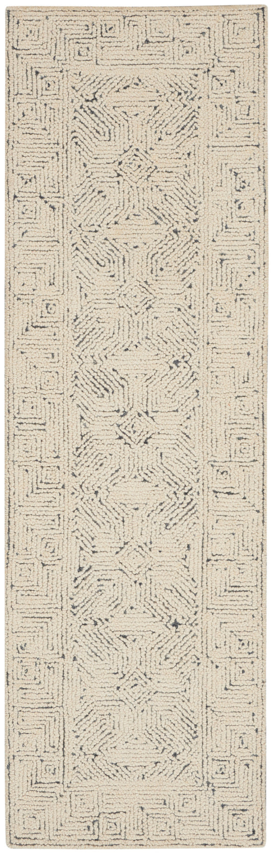 Cream shag rug with blue-gray geometric border and central motifs; soft, textured rectangular area rug for living spaces.