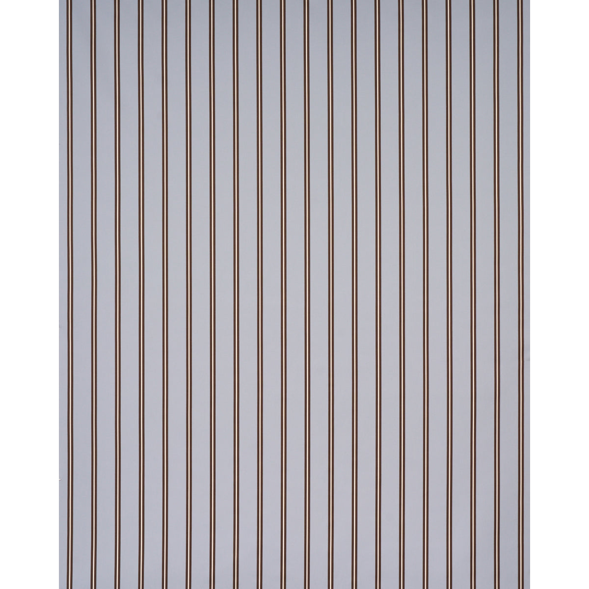 Close-up of thin copper-toned vertical slats creating a striped decorative wall panel.