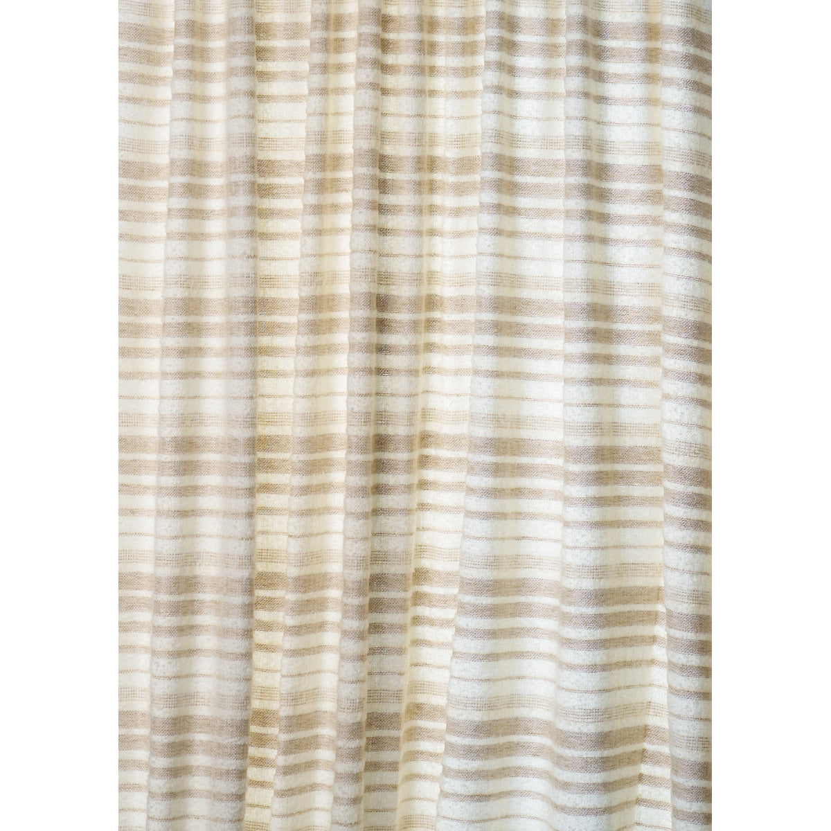 Beige and cream striped curtain fabric with soft, pleated folds; neutral window drapery.
