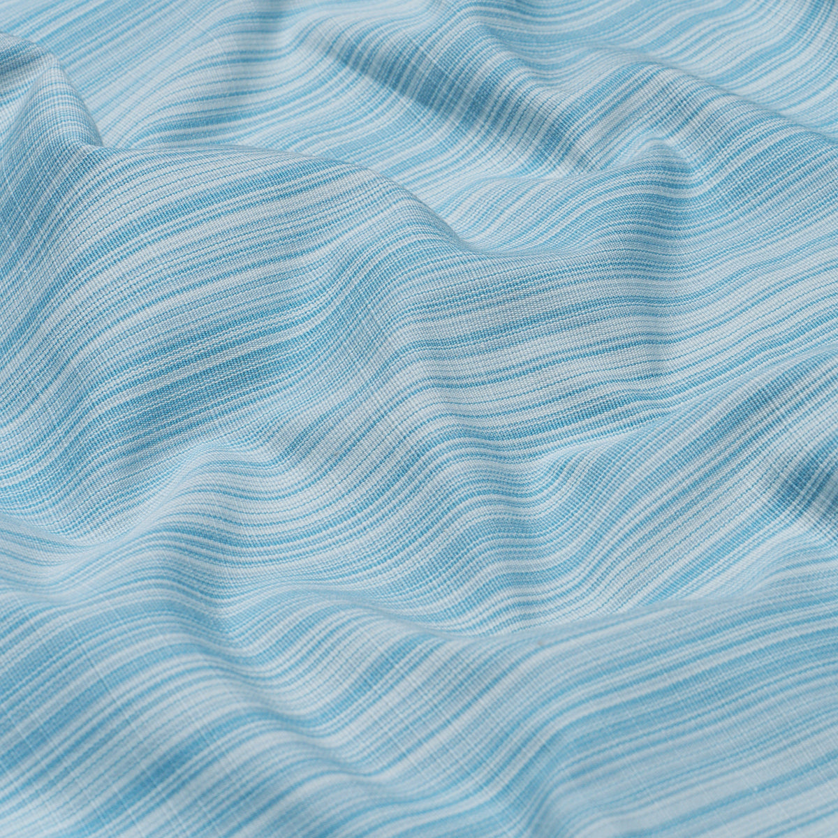 Robin's egg blue striped woven fabric with white stripes, draped in soft waves.