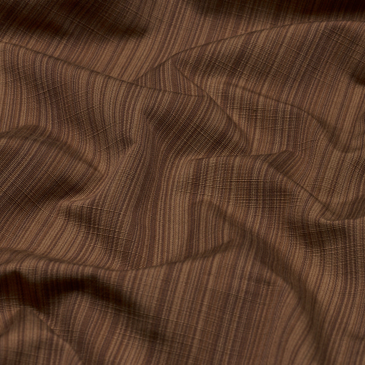 Brown striped fabric with subtle pinstripe, soft drape, likely wool or cotton blend, suitable for apparel.