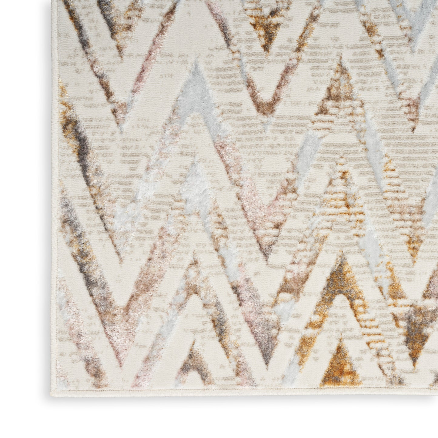 Chevron rug with cream base and pastel metallic zigzags in gold, bronze, pink, blue; woven textured decor.