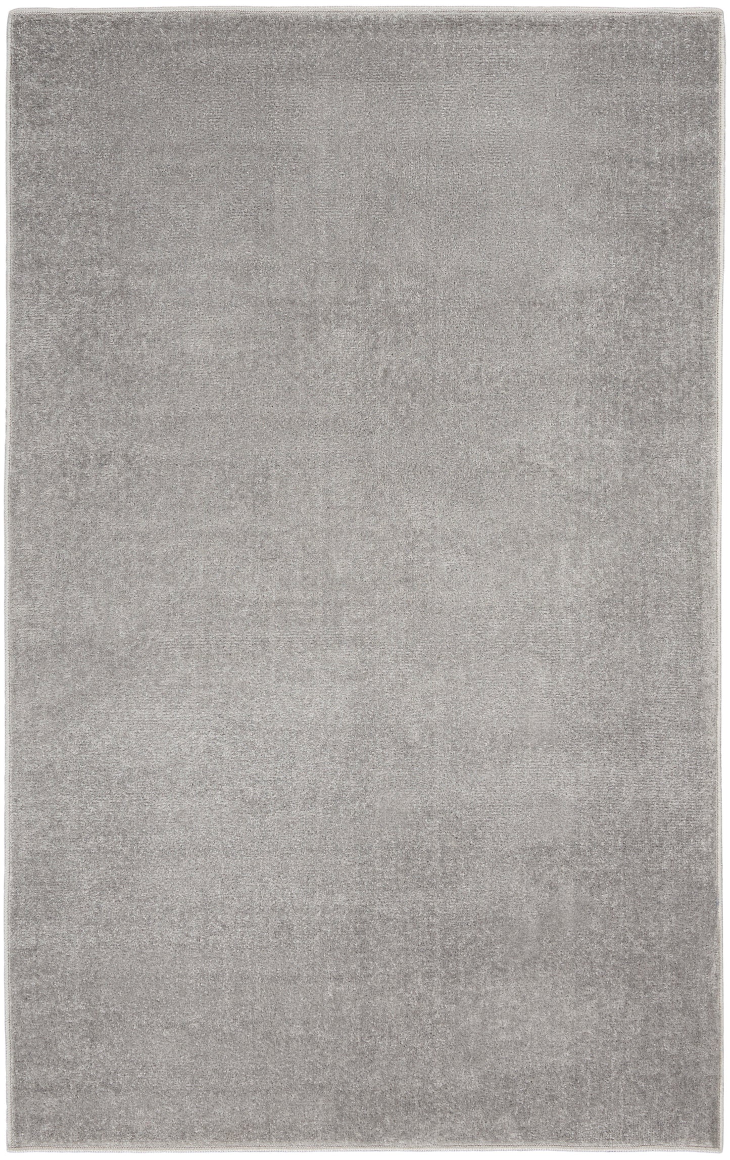Soft gray outdoor area rug with plush pile and subtle tonal shading.