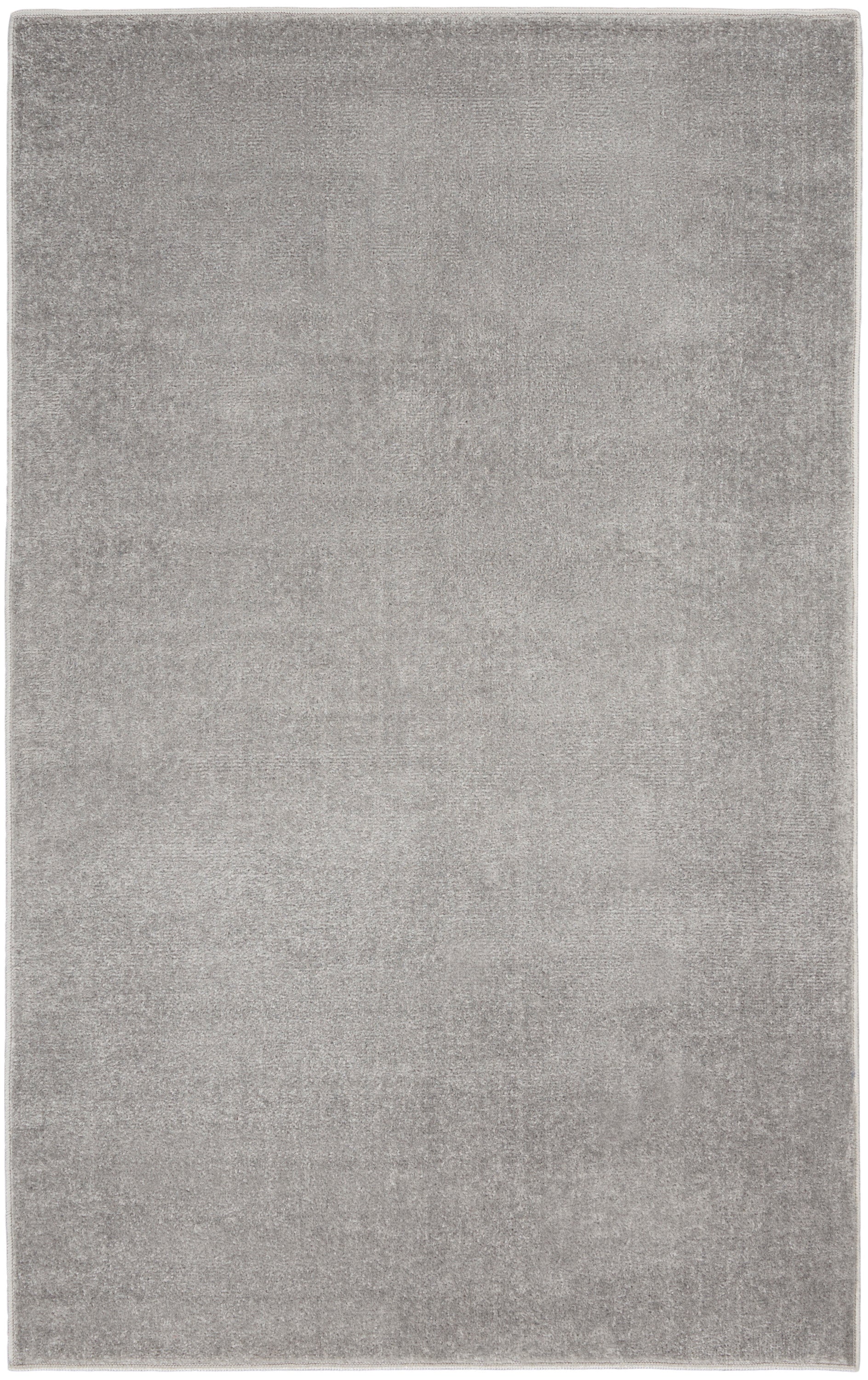 Soft gray outdoor area rug with plush pile and subtle tonal shading.