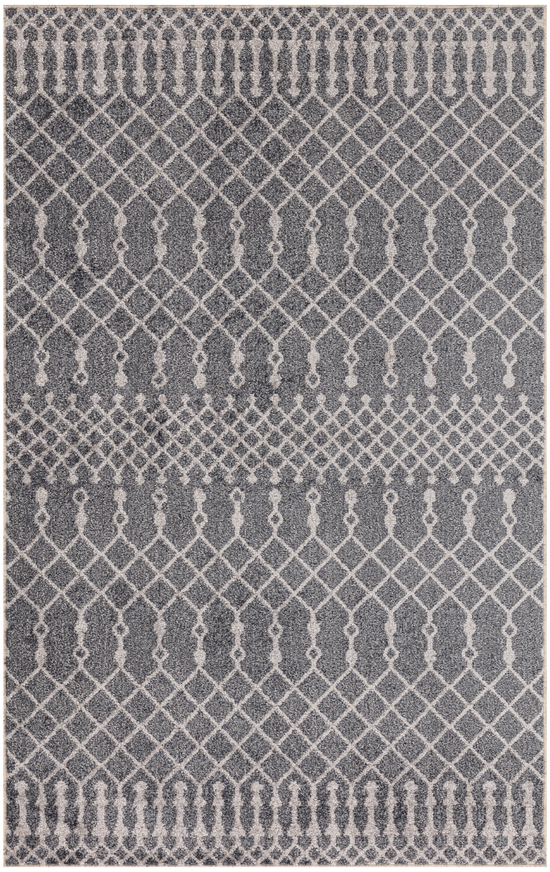 Grey area rug with white geometric lattice and teardrop motifs; contemporary, boho-style rug.