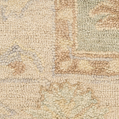 Beige shag rug with a soft chunky pile and subtle abstract pattern in cream, tan, and light gray.