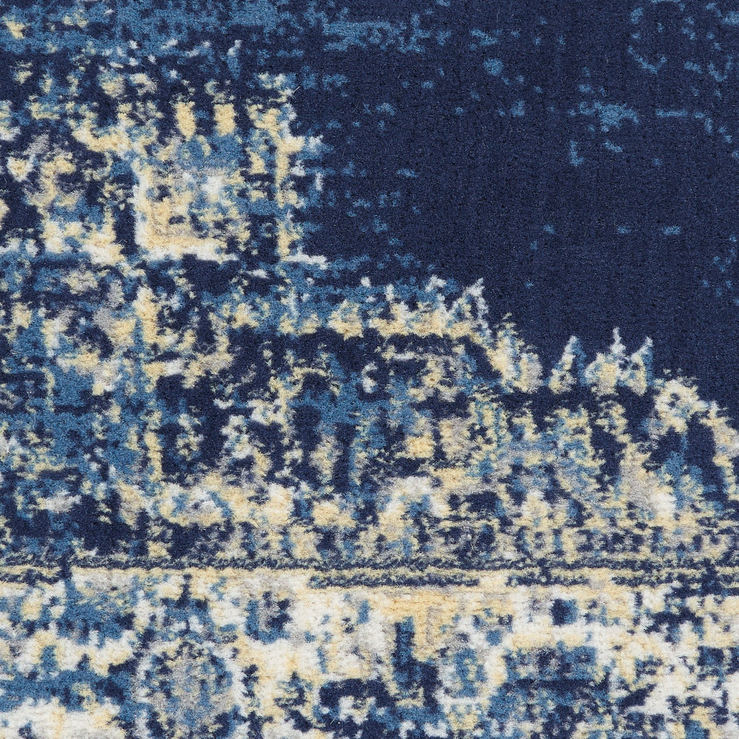 Blue and cream distressed abstract rug with textured pile and landscape-like pattern, ideal for living rooms.