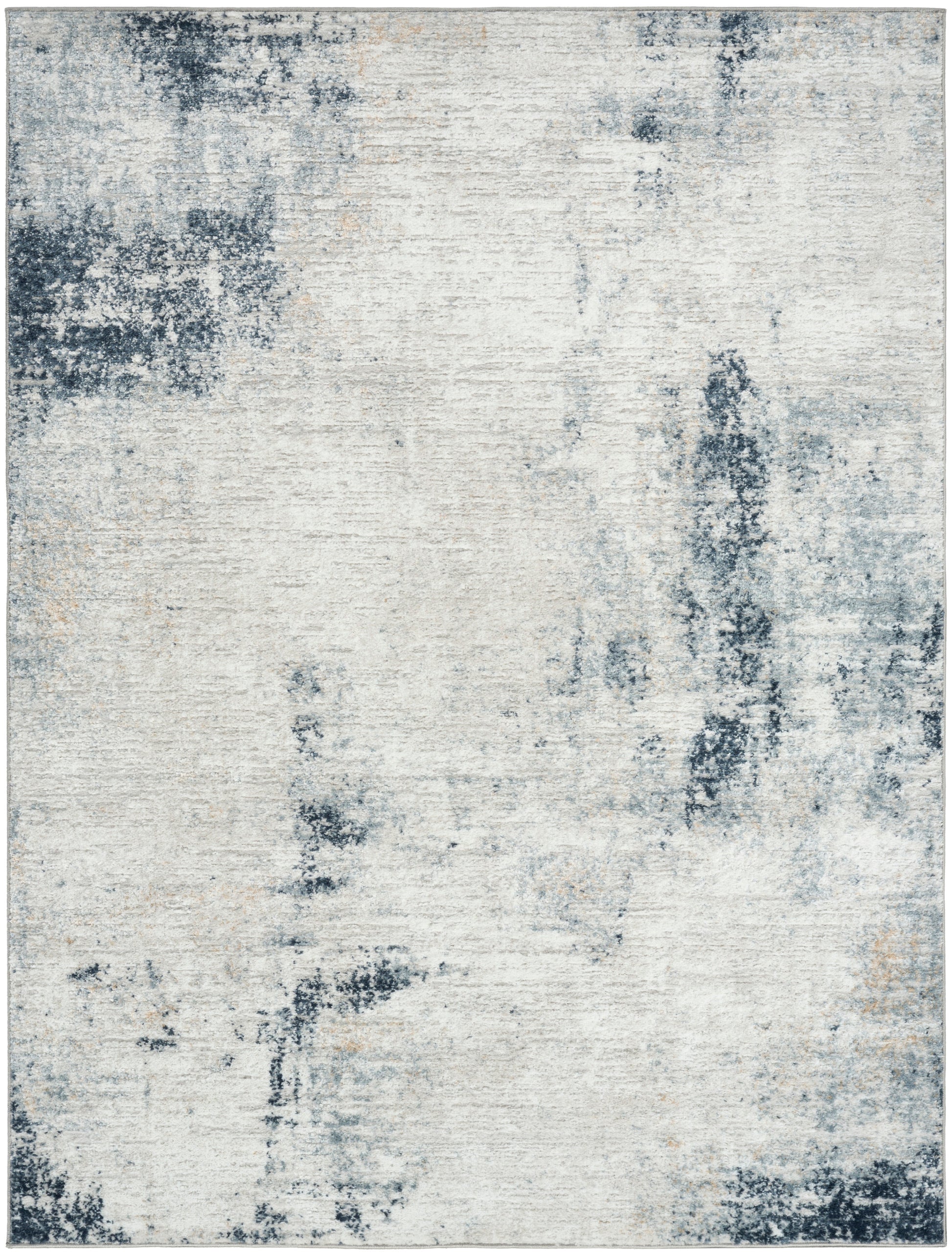 Abstract distressed area rug in ivory and navy-blue tones with textured, painterly patches.