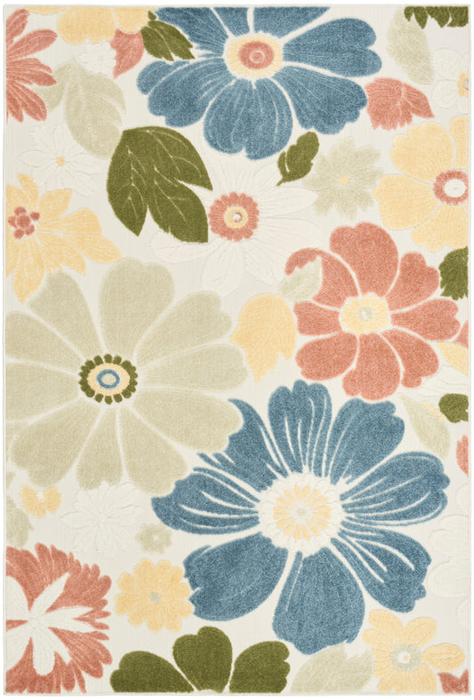 Large floral rug with blue, coral, pale yellow blossoms and green leaves on cream background.