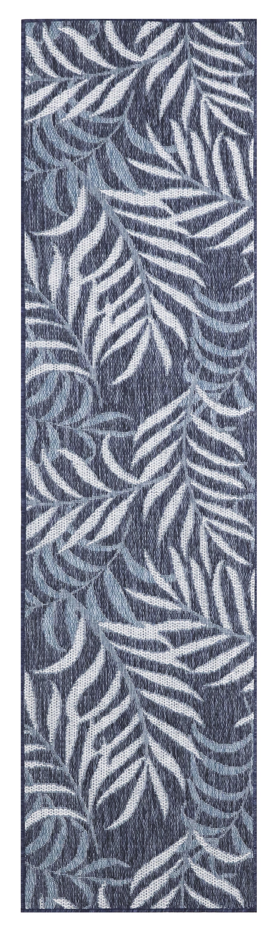Blue rug runner with white fern leaf pattern; tropical coastal textile for hallway or foyer.