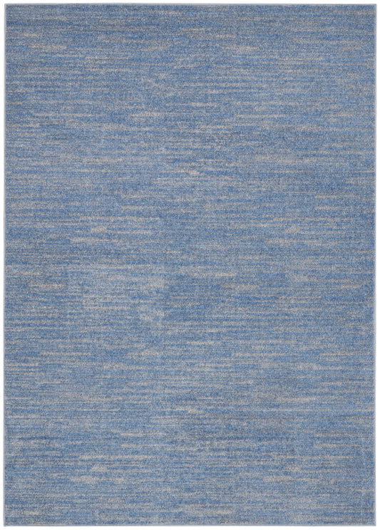 Blue textured area rug with pale beige flecks, rectangular, modern soft-weave for living rooms.