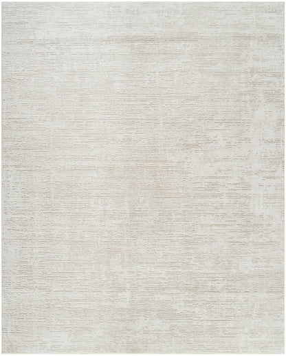 Cream-neutral flat-weave rug with a soft, textured surface in a minimalist modern style.