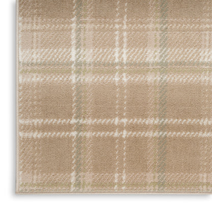 Beige plaid rug with cream and sage green lines, soft plush pile for a cozy home decor accent.