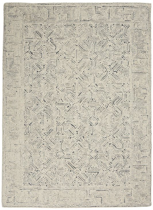 Rectangular cream and charcoal area rug with geometric medallion center and Greek-key border; plush tufted pile.