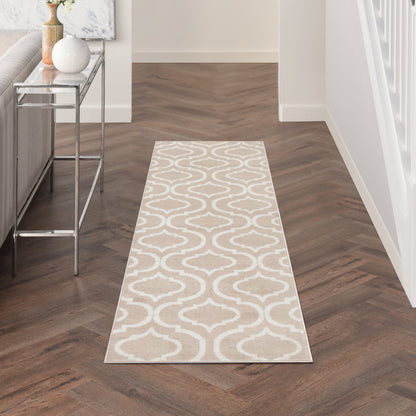 Beige runner rug with white interlocking arabesque pattern in a dark wood hallway; chrome-glass console on the left.