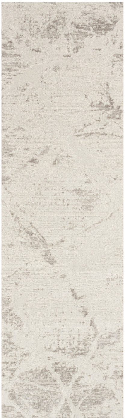 Beige floor rug runner with subtle gray marbled pattern.