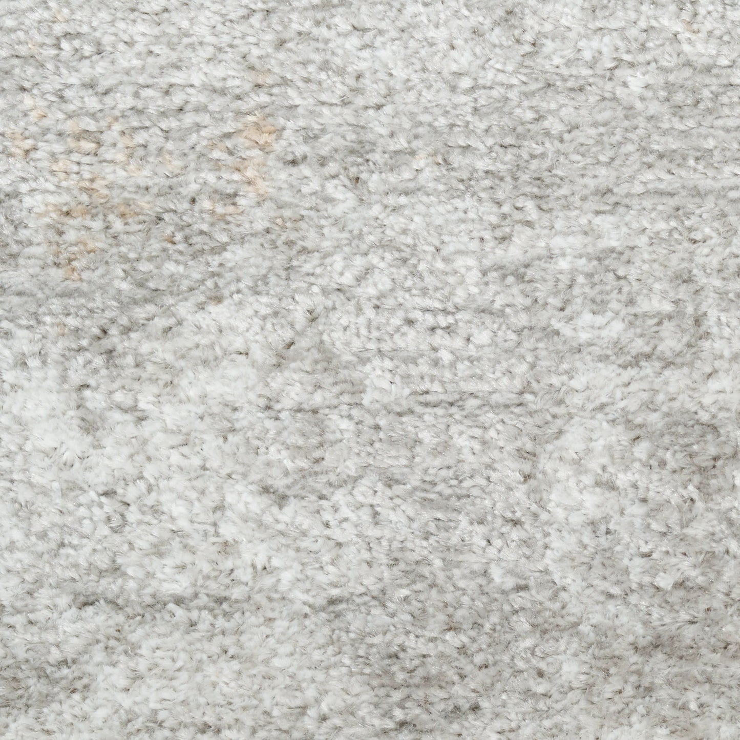 Light gray shag rug with dense plush pile and subtle cream flecks.