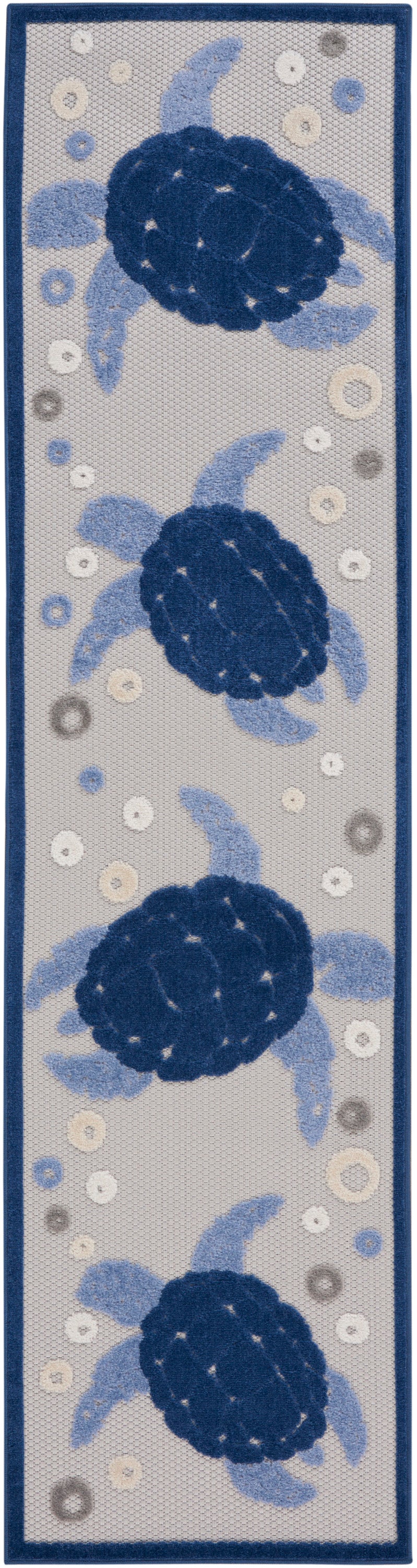 Runner rug featuring three navy sea turtles with light blue flippers on gray background, bordered in dark blue.