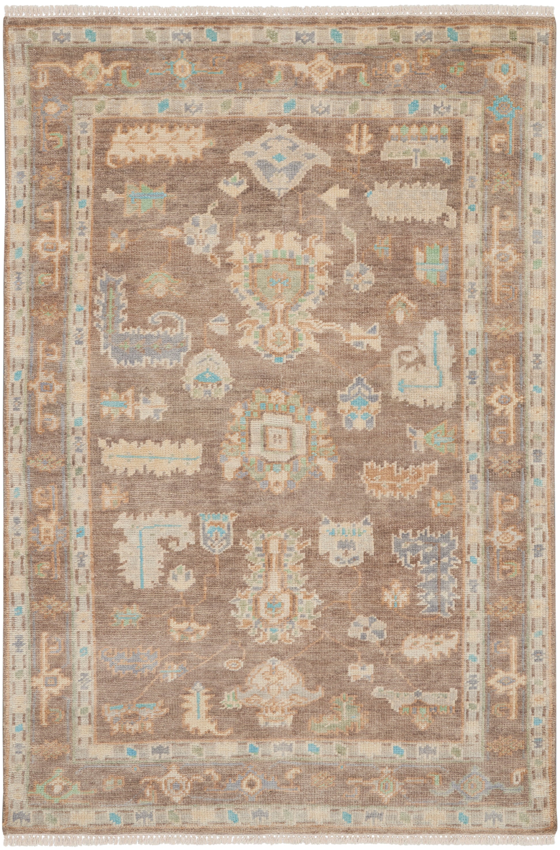 Brown oriental rug with cream border, teal and pastel blue accents, central medallion and geometric motifs, fringed ends.