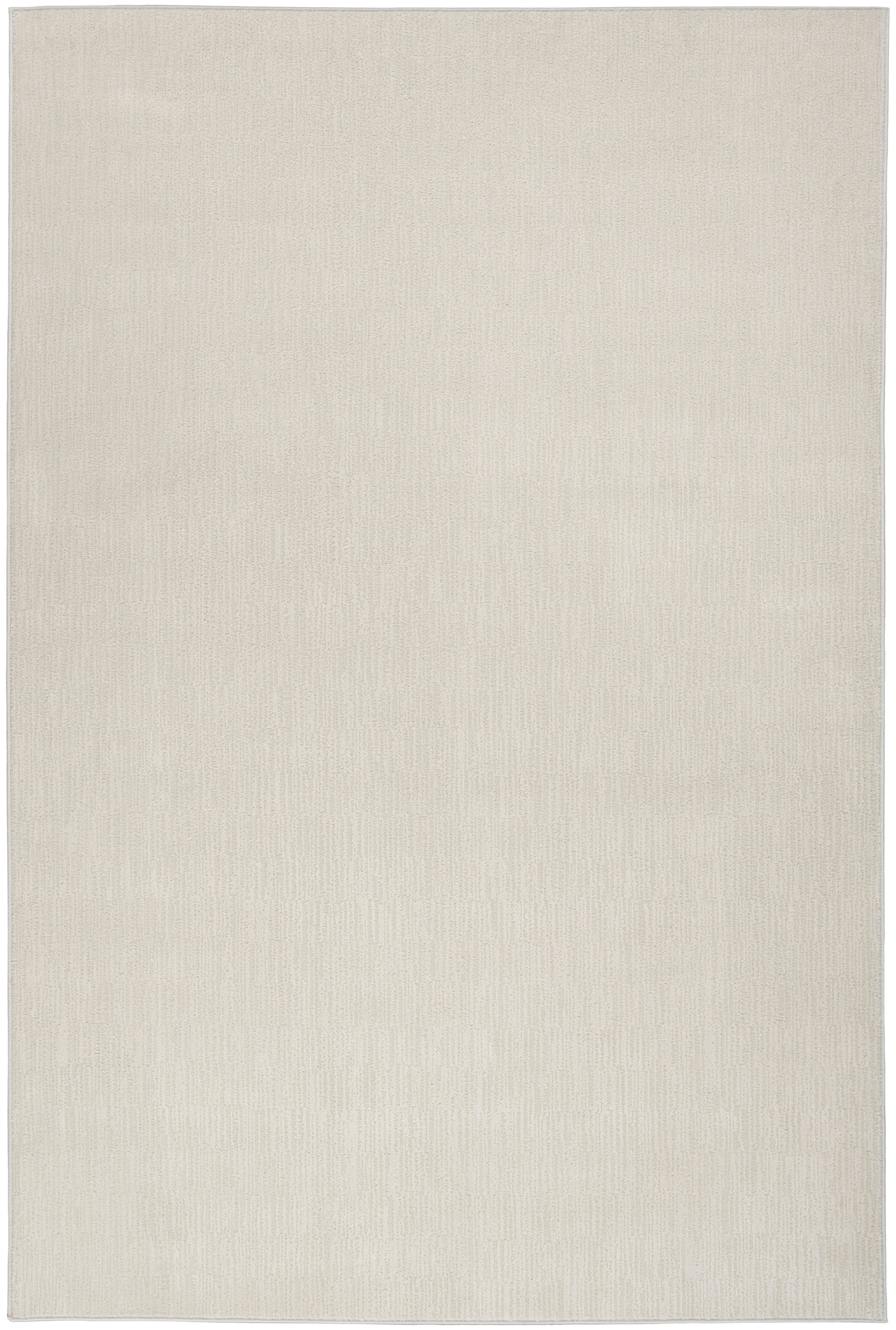 Cream beige rectangular rug with subtle woven texture, minimalist neutral decor.