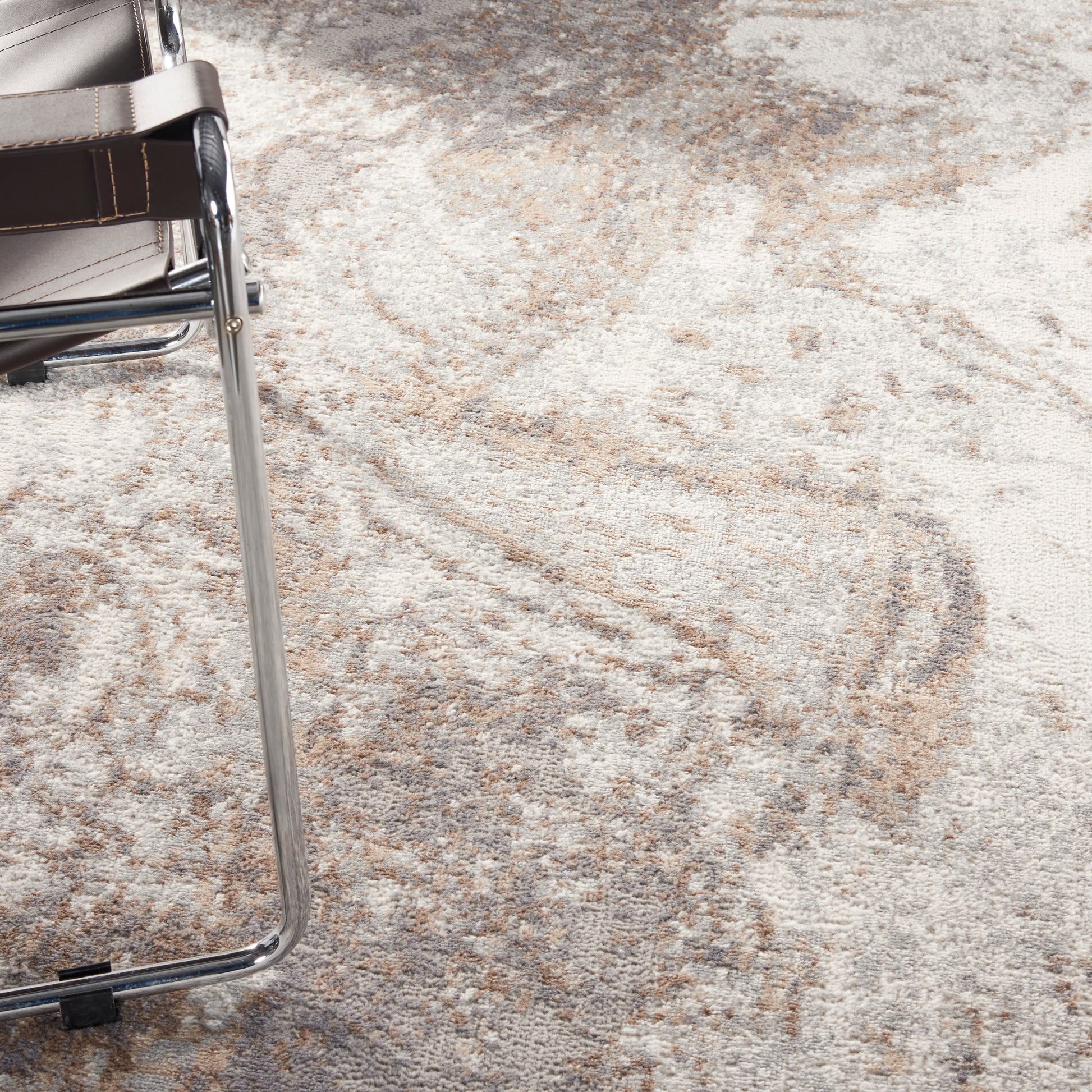 Beige patterned rug.