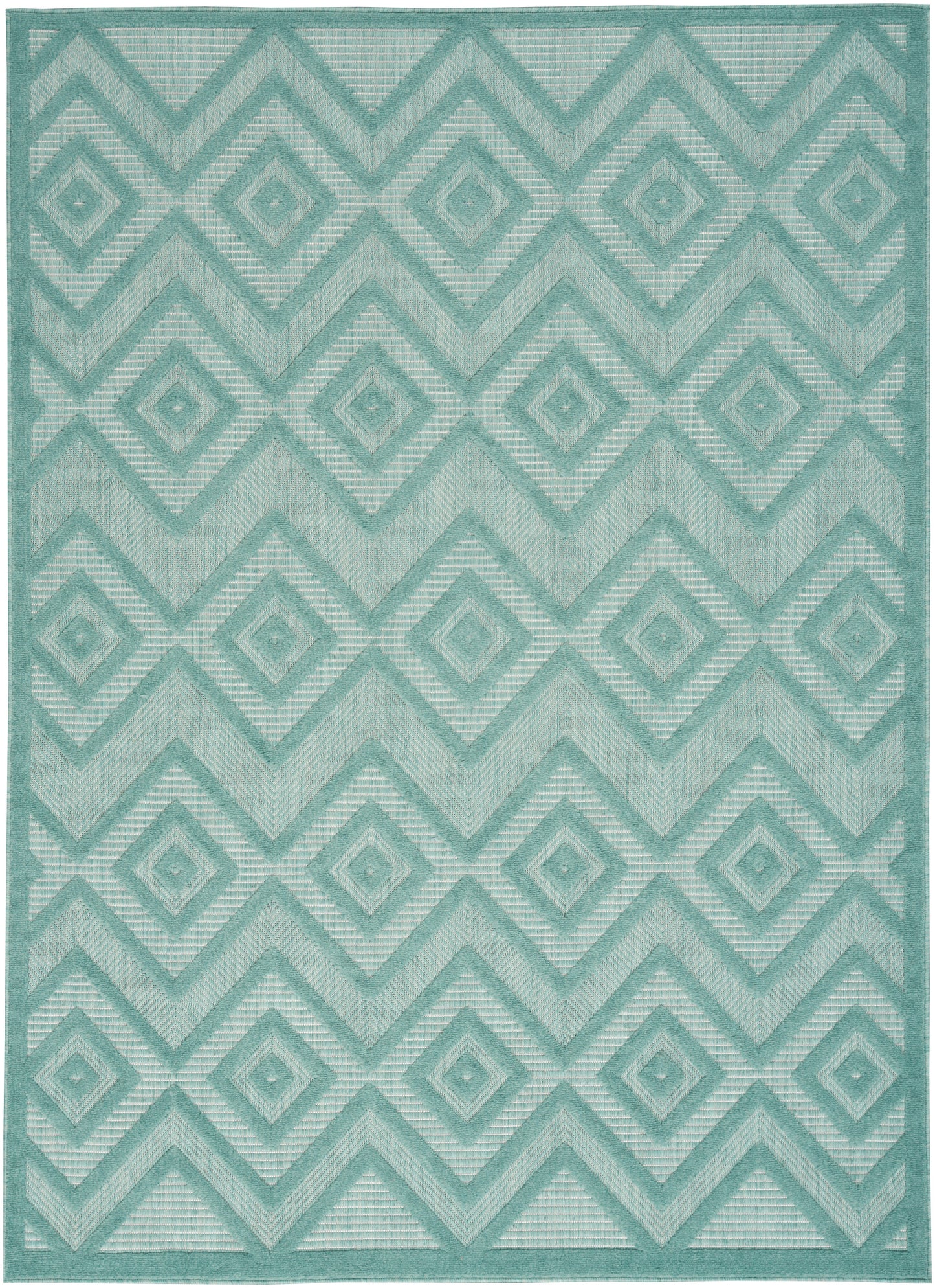 Teal geometric rug with interlocking diamond & chevron motifs; woven texture, modern tribal style.