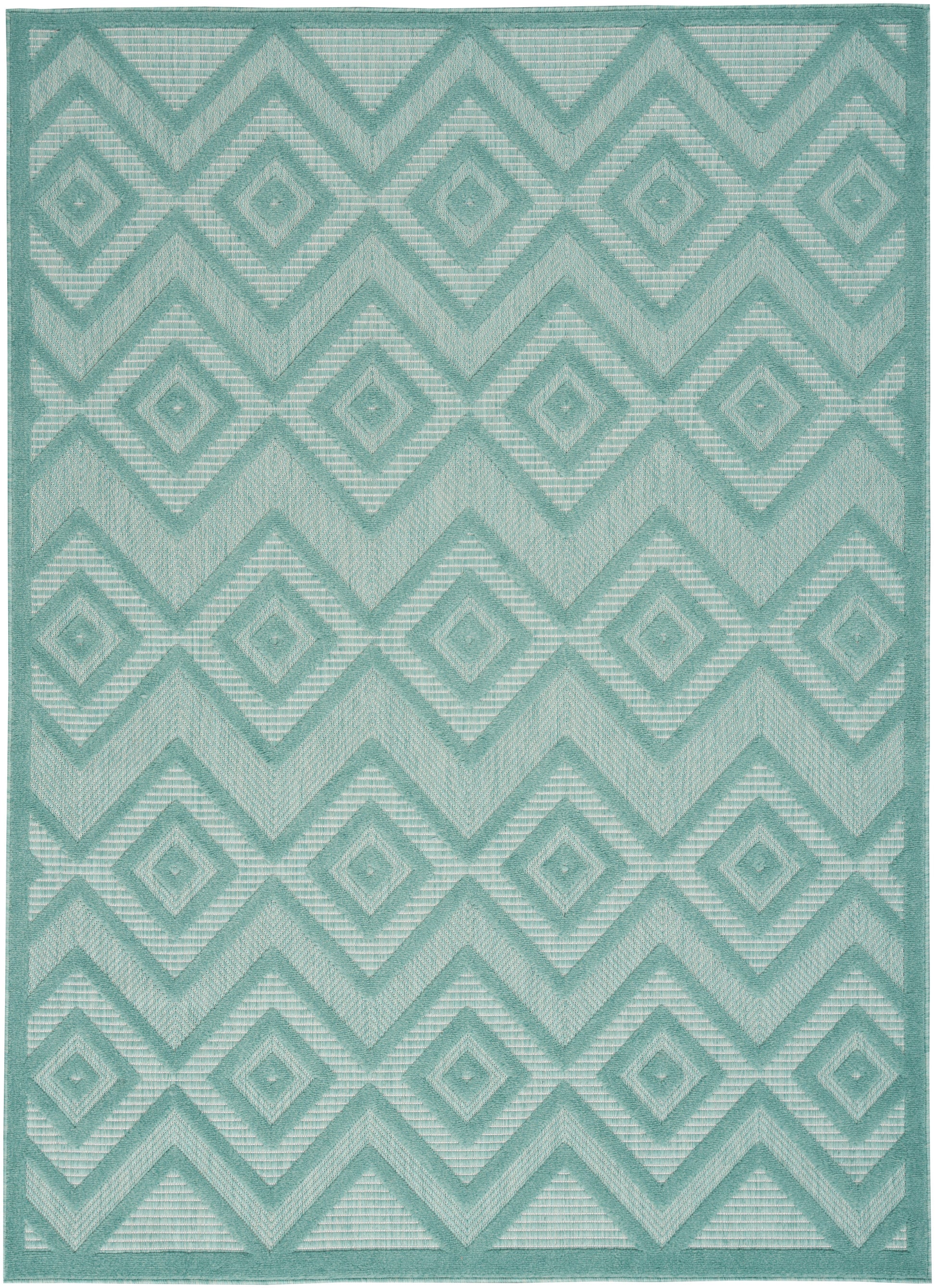 Teal geometric rug with interlocking diamond & chevron motifs; woven texture, modern tribal style.