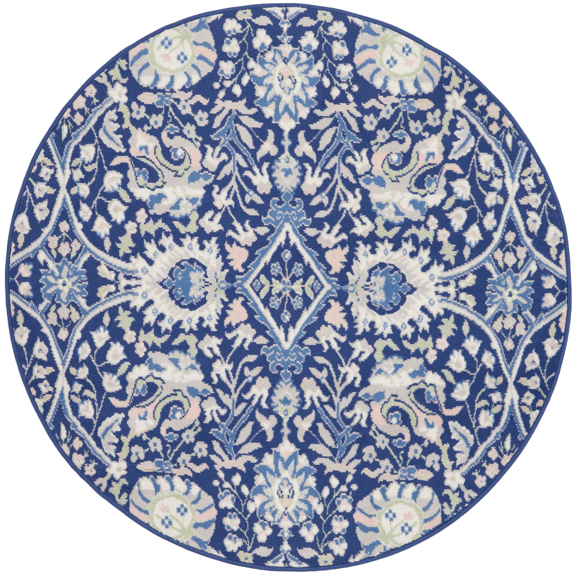 Round navy rug with intricate white floral damask pattern.