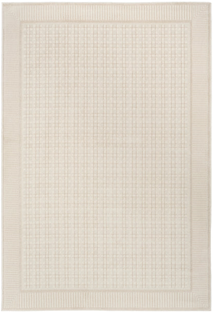 Cream rectangular rug with grid-pattern center and chunky textured border for a modern neutral living room.