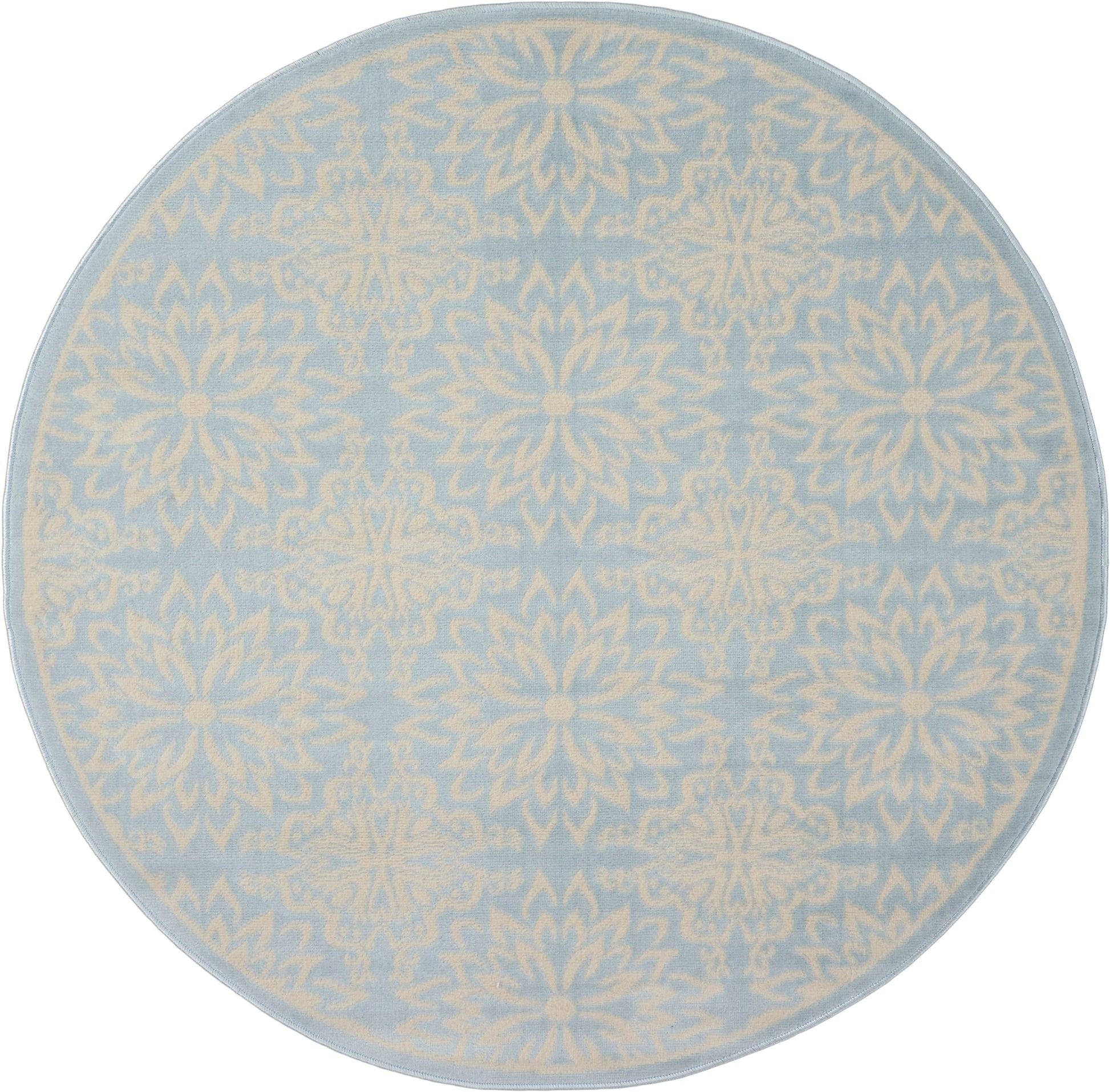 Round rug in pale blue with cream damask floral pattern; soft decorative accent for living room.